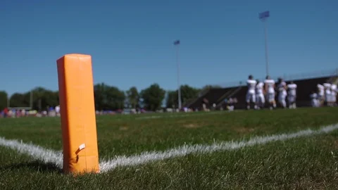 Orange pylon in the back of the end zone 스톡 동영상 104658523