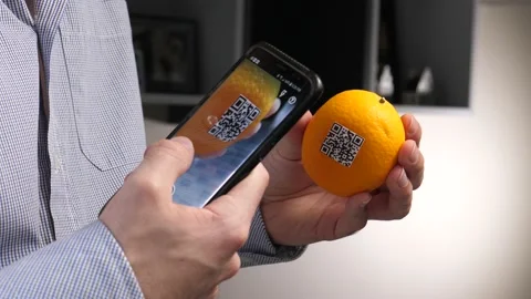 Orange With a QR Code Being Scanned by Smartphone Stock Footage 140467951