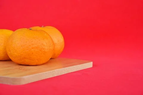 Orange with red background. Stock Photos