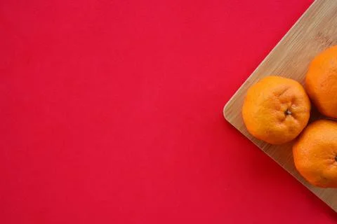 Orange with red background. Stock Photos