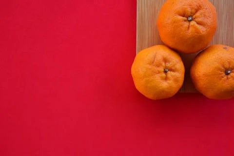 Orange with red background. Stock Photos