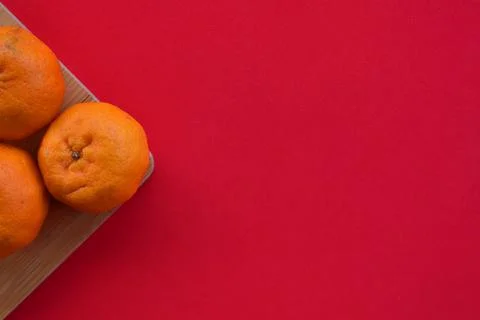 Orange with red background. Stock Photos
