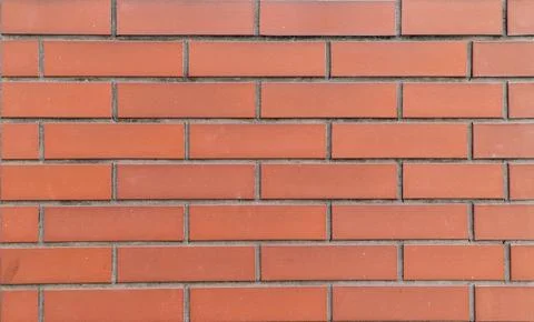 Orange Red Brick Wall Background with Even Rows and Copy Space Stock Photos