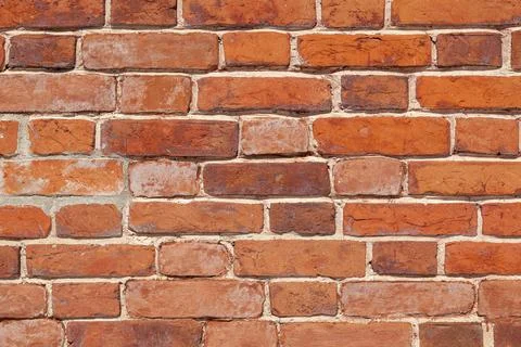 Orange red brick wall texture background Stock Photos
