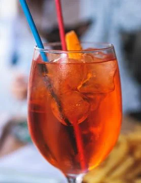 Orange red colored aperitif alcohol cocktails on a party, beautiful view of.. Fotos de archivo