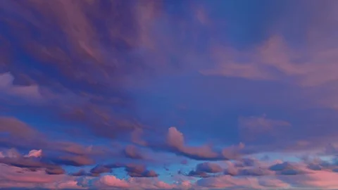 Orange red fiery sky clouds at dusk sunset sunrise time lapse seamless loop Stockbeeldmateriaal 88025978