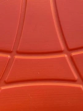 Orange red geometric rubber surface abstract texture background Stock Photos
