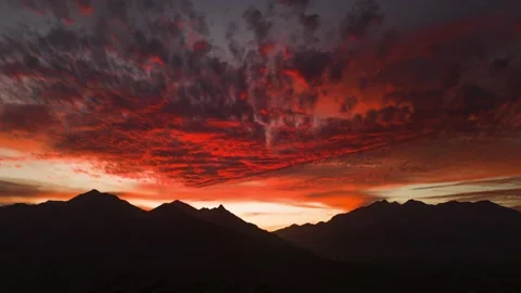 Orange to red sunset hyperlapse above a mountain range Stock Footage 237170149