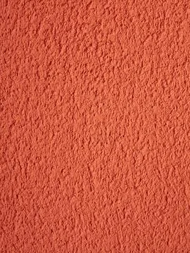 Orange red textured wall surface background Foto stock