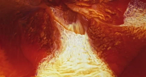 Orange red white liquid flowing in fire lava, abstract background. Colorful Stock Footage 196815102