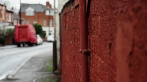 A orange reddish pipe and wall Stock Footage 229173045