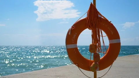 Orange ring buoy/lifebuoy Stock Footage 123554531