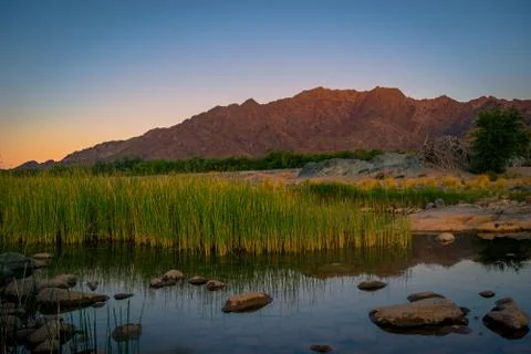 Orange river at sunset Stock Photos