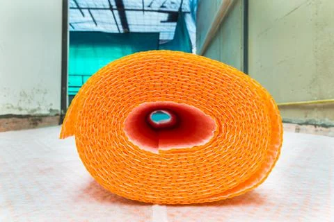 Orange roll of membrane waterproofing, separation and steam escape Stock Photos