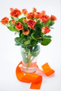 Orange roses in vase Stock Photos