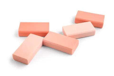 Orange rubber erasers on white background Stock Photos