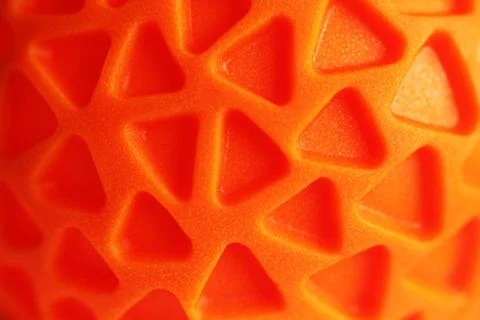 Orange rubber texture with triagle pattern Orange rubber texture with tria... Foto stock