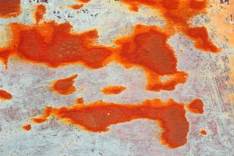 Orange rust on metal surface Stock Photos