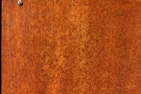 Orange rusted metal texture background, close up of corroded steel sheet Stock Photos