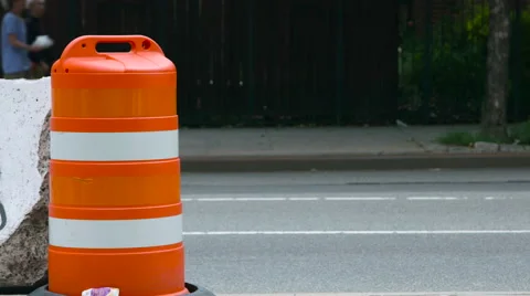 Orange Safty Drum on the street in Brooklyn New York during the day Video stock 63658223