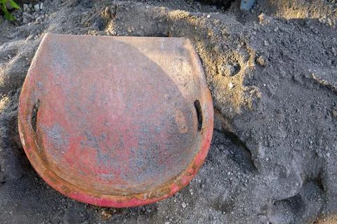 Orange sand picker Stock Photos