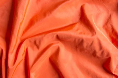 Orange satin background texture Stock Photos