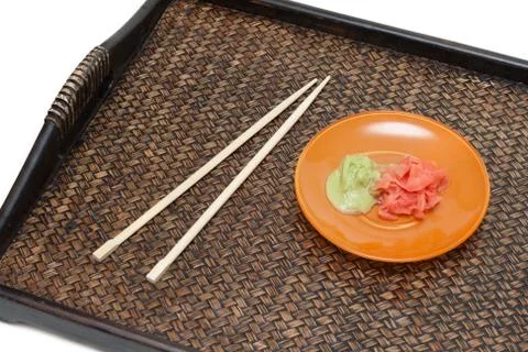 Orange saucer with ginger Stock Photos