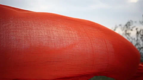 Orange scarf on the strong wind Stock Footage 56023238