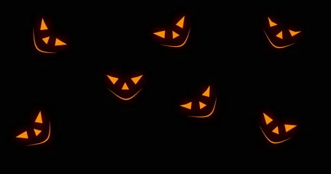 Orange scary pumpkin faces appearing on black background. Halloween concept. 4k Stock Footage 161841433