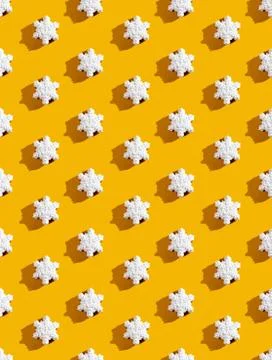 Orange seamless background snowflake pattern decor Stock Photos