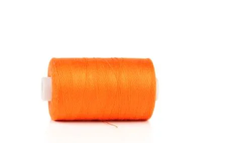 Orange sewing thread Stock Photos