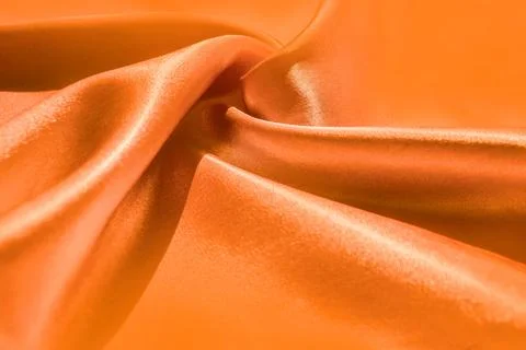Orange silk - texture, background Stock Photos