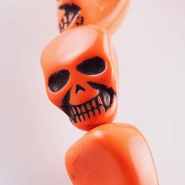 Orange skull Stock Photos