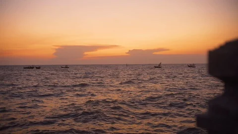 Orange Sky, After Sunset Seascape with Fishing Boats Stock Footage 128672991