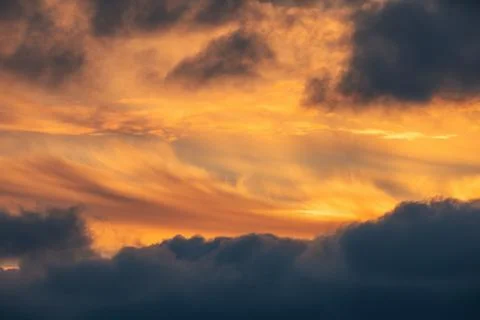 Orange sky horizon with dramatic cloudscape, sunset shot 写真素材