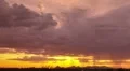 Orange sky with rain clouds after sunset time lapse HD Footage