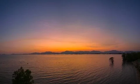 Orange sky at sunset above Khao Khad viewpoint Phuket. Beautiful The glare of Stock Photos