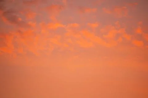 An orange sky at sunset Stock Photos