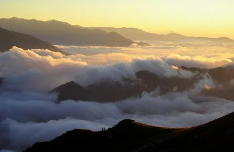 Orange sky, white clouds. White clouds background. Stock Photos