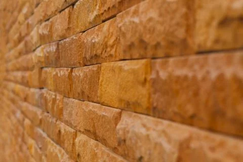 Orange slate stone wall for pattern and background Stock Photos