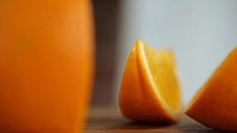 Orange Slice and Whole Rotating Closeup Stock Footage 99164161