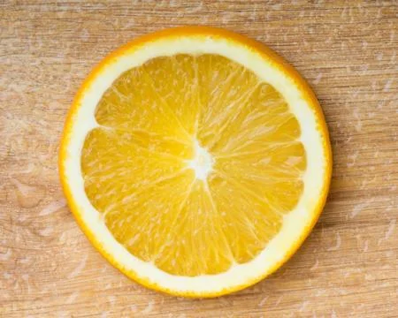 Orange slice closeup Stock Photos