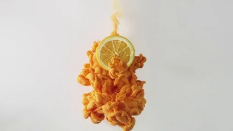 Orange slice ink explosion Stock Footage 79539435