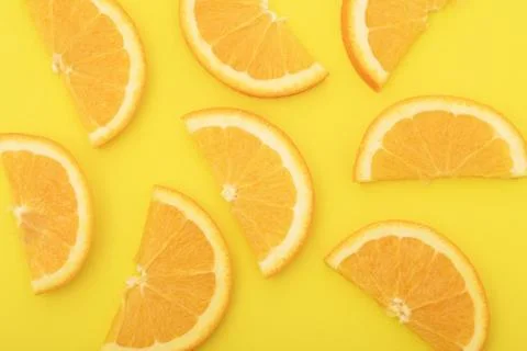 Orange slice isolated on orange background. Stock Photos