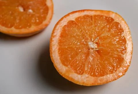 Orange slice juice inside pulp Stock Photos