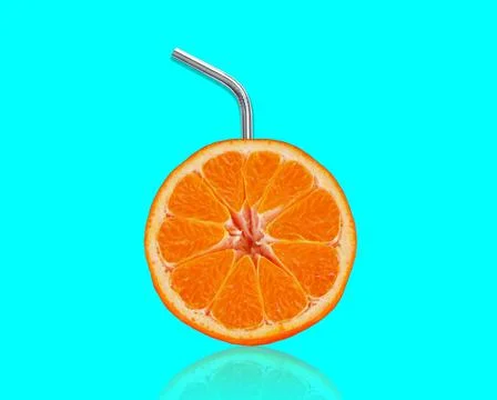 Orange slice with reusable drinking straw on blue background. Stock Photos