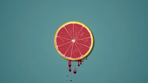 Orange slice rotating on blue background - animation Stock Footage 109479910