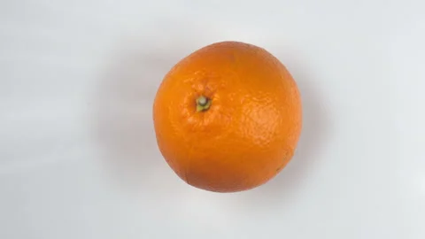 Orange slice shooting with high speed camera Stock Footage 88490787