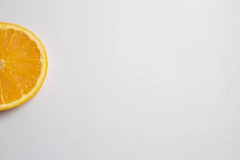 Orange slice on white background Stock Photos