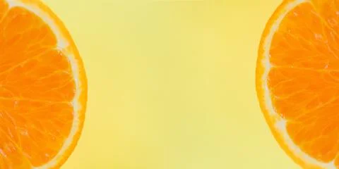 Orange slice on yellow background - close up of fresh Orange fruit , top view Foto stock